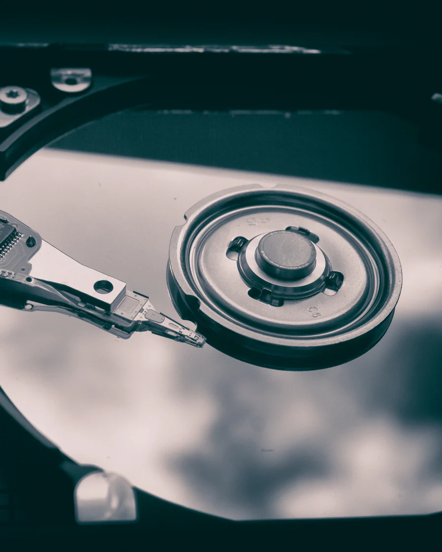 The read-write arm and platter inside a hard disk drive